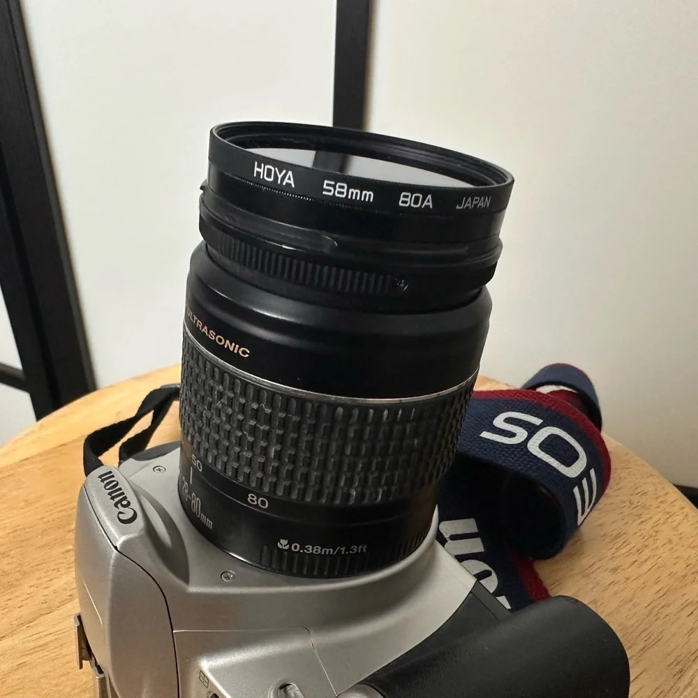 Canon EOS 300 Film Silver Camera with Black Lens
